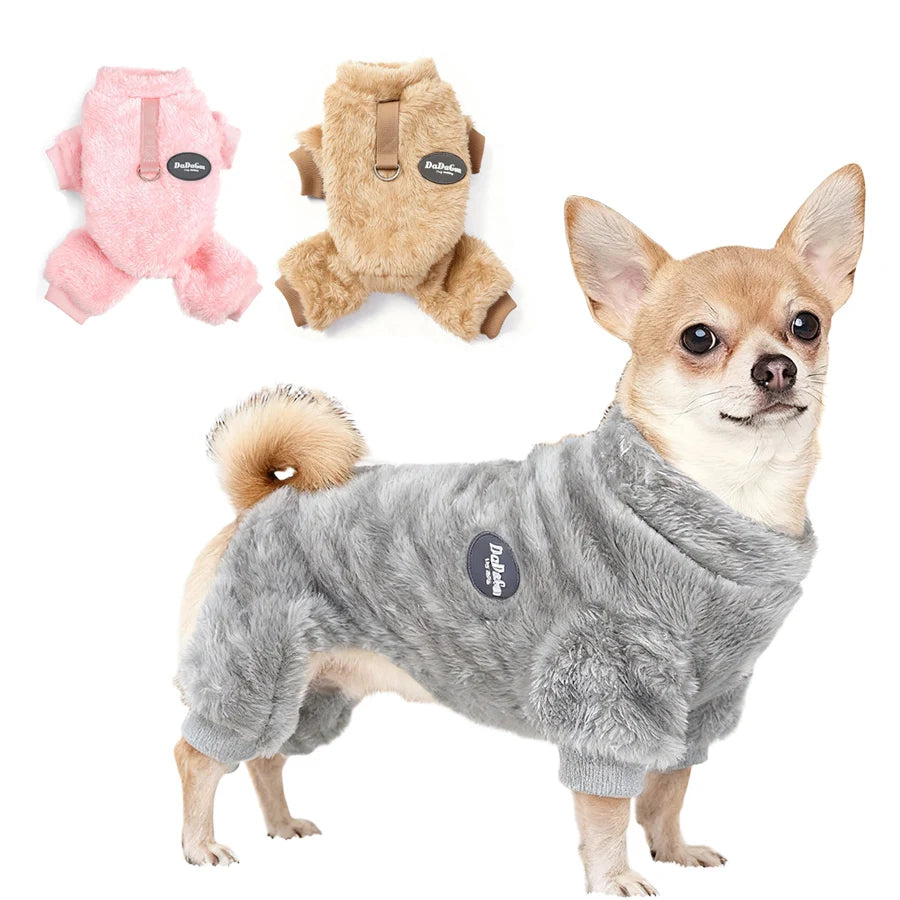 Dog wearing a gray fluffy outfit with two additional outfits in pink and brown on a white background.